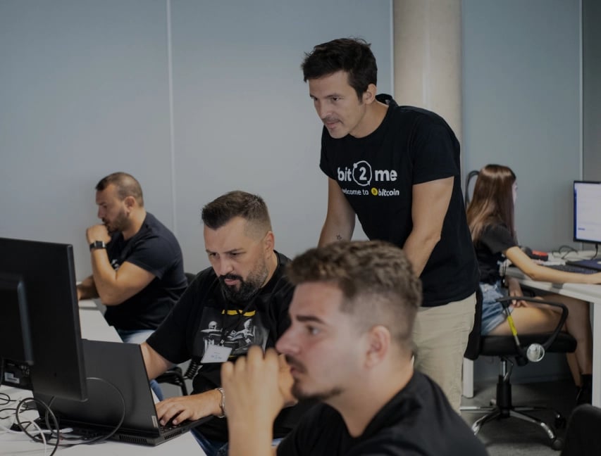 Bit2Me team working